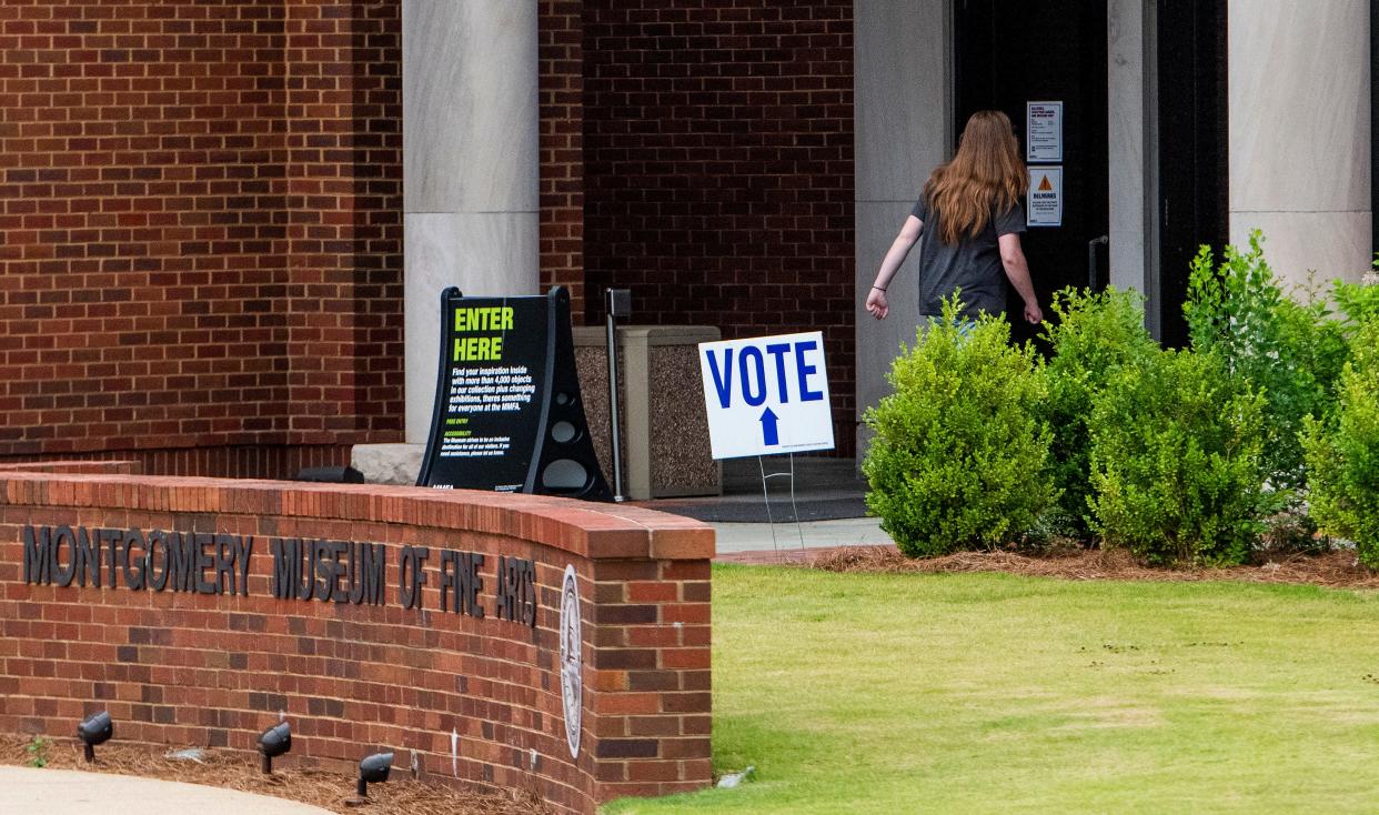 Voters arrive to vote at the Montgomery Museum of Fine Arts polling Place in Montgomery, Ala., on primary Election Day, Tuesday May 24, 2022. 