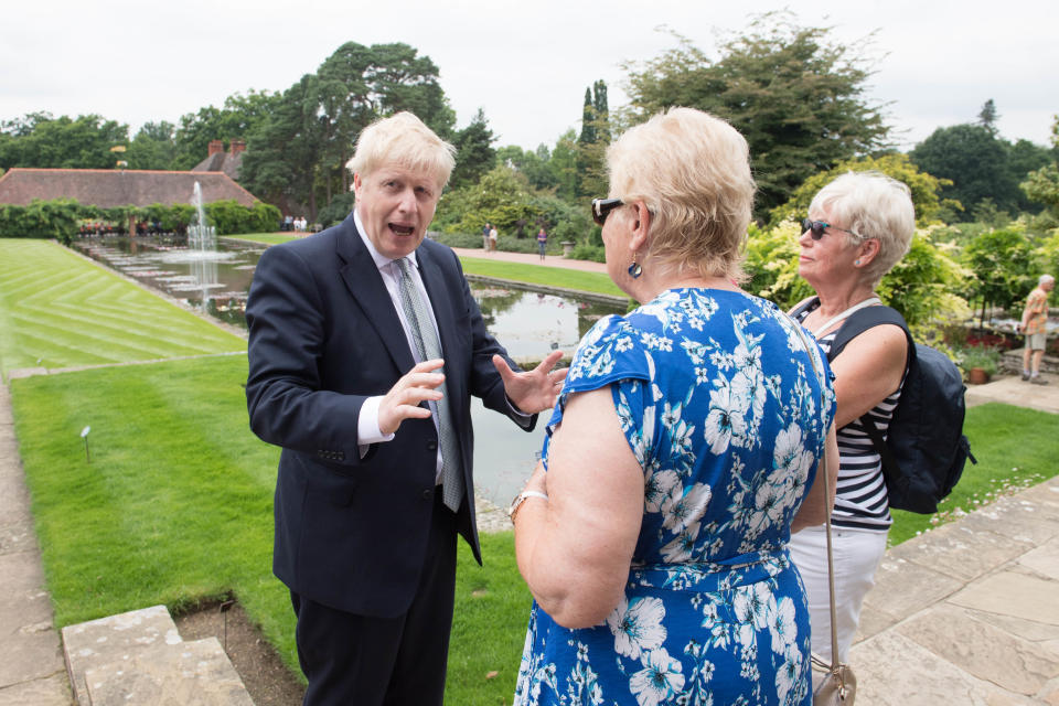 Conservative party leadership candidate Boris Johnson talks to visitors during a tour of the RHS (Royal Horticultural Society) garden at Wisley, in Surrey.