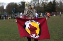 A supporter in a werewolf costume watches teams take part in the Harry Potter inspired, Quidditch British Cup in Rugeley, Britain, March 12, 2017. REUTERS/Neil Hall