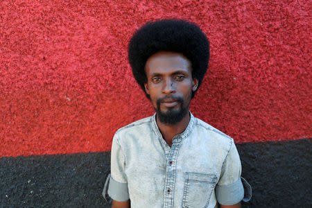 Abdi Gammachu, a 27-year-old nurse, poses for a portrait after attending an Oromo Liberation Front (OLF) rally in the town of Woliso, Oromia region, Ethiopia, October 22, 2018. REUTERS/Tiksa Negeri