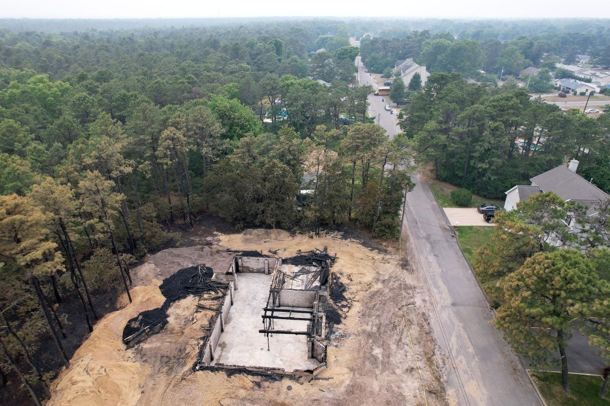 The remains of 1932 1st Avenue in Manchester is shown Thursday, June 8, 2023. Ron Carr, a Manchester man, was charged with arson and other crimes in a hate-crime spree..