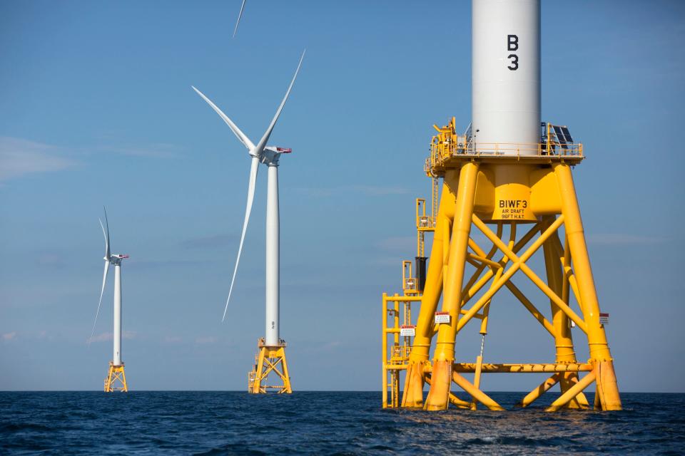 FILE - Three wind turbines from Deepwater Wind stand in the water off Block Island, R.I, the nation's first offshore wind farm, Aug. 15, 2016. Another planned offshore wind farm, by Revolution Wind, moved a step closer to construction on Tuesday, Aug. 22, 2023, with the Department of the Interior announcing it has approved the project, to be located in federal waters about 15 miles southeast of Point Judith, R.I, and south of Martha's Vineyard, Mass. (AP Photo/Michael Dwyer, File)