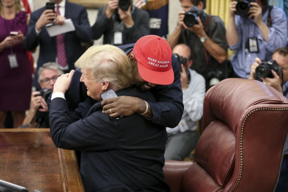 <div class="inline-image__title">1051906886</div> <div class="inline-image__caption"><p>Kanye West hugs President Donald Trump during a meeting in the Oval office in 2018.</p></div> <div class="inline-image__credit">Pool</div>