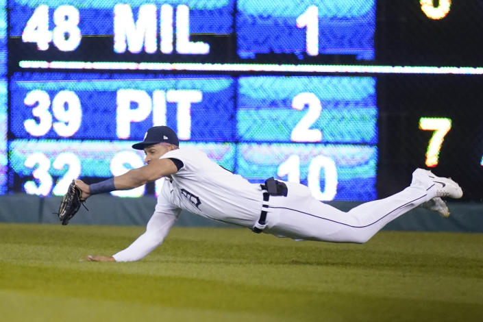 Detroit Tigers right fielder Victor Reyes catches the fly out hit by Minnesota Twins' Carlos Correa during the ninth inning of a baseball game, Saturday, Oct. 1, 2022, in Detroit. (AP Photo/Carlos Osorio)