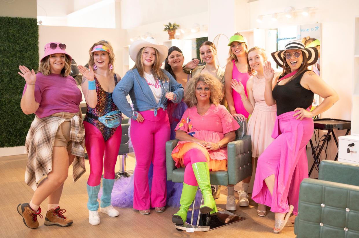 Owner Liz Hannold and students dress as characters from 'Barbie' at Professional Academy of Cosmetology in Marshall on Friday, June 21, 2023.