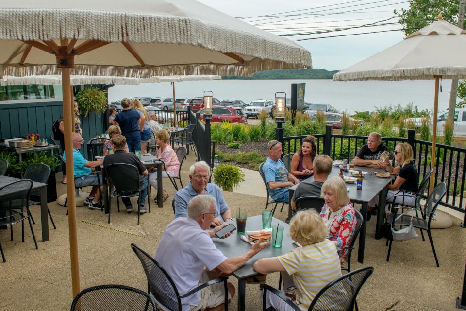 Patrons dine on the patio with a view of the Illinois River at Sweetwater Kitchen & Cocktails at 3637 N. River Beach Drive in Chillicothe.