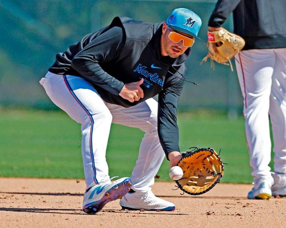 Miami Marlins first baseman Trey Mancini fields the ball during spring training at Roger Dean Chevrolet Stadium in Jupiter, Florida on Tuesday, February 20, 2024.