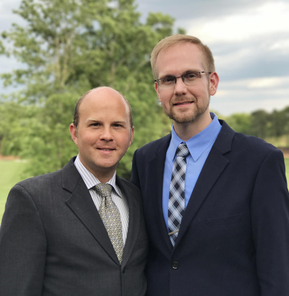 Image: Joshua Payne-Elliott, right, with his husband Layton Payne-Elliott (Courtesy Kathleen A. DeLaney)