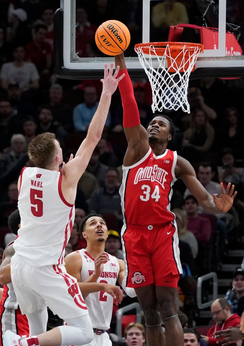 Mar 8, 2023; Chicago, IL, USA; Ohio State Buckeyes center Felix Okpara (34) blocks a shot by Wisconsin Badgers forward Tyler Wahl (5) during the second half at United Center. Mandatory Credit: David Banks-USA TODAY Sports
