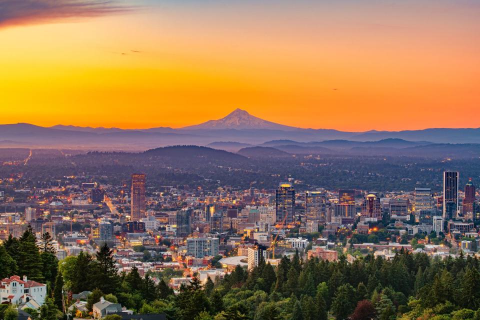 Portland, Oregon, USA downtown skyline with Mt. Hood at dawn.