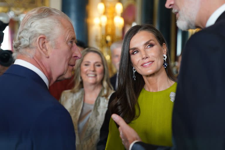 Britain's King Charles III (L) speaks with Spain's King Felipe VI (R) and Spain's Queen Letizia (C) during a reception for overseas guests attending his coronation, at Buckingham Palace in central London on May 5, 2023. (Photo by Jacob King / POOL / AFP)
