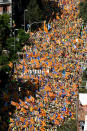 <p>Estelada (Catalan separatist flags) are waved as thousands of people gather for a rally on Catalonia’s national day ‘La Diada’ in Barcelona, Spain, Sept. 11, 2017. (Photo: Albert Gea/Reuters) </p>