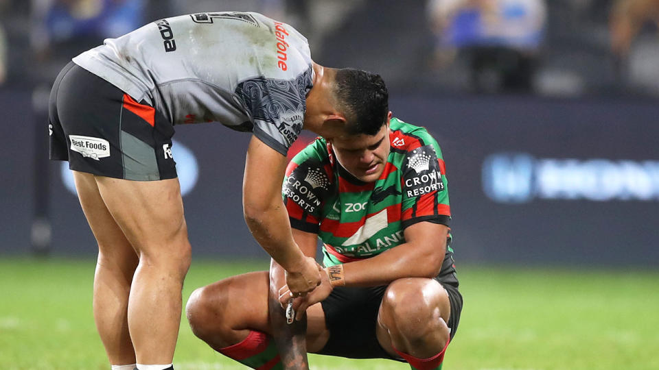 Seen here, Warriors star Roger Tuivasa-Sheck consoles Latrell Mitchell.