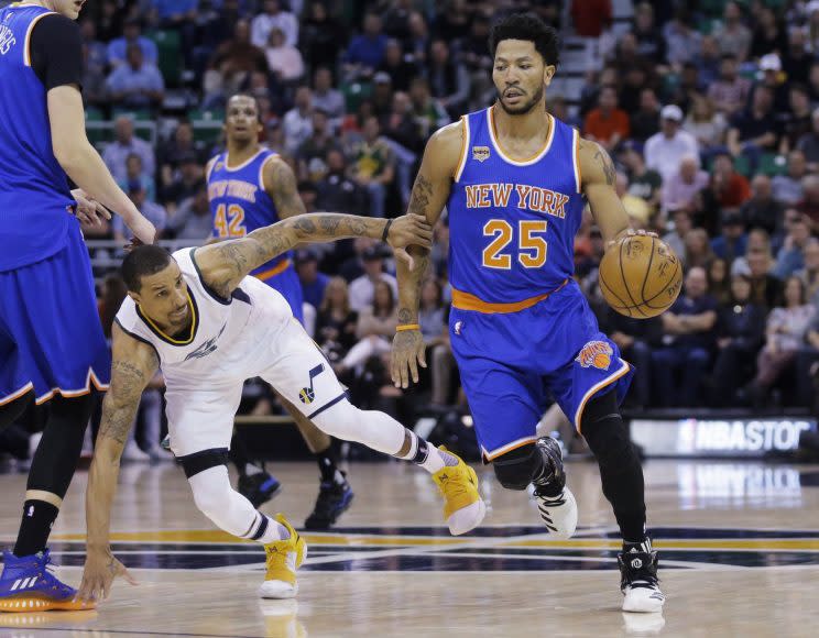 George Hill tries to keep up with Derrick Rose, or is it the other way around? (AP)