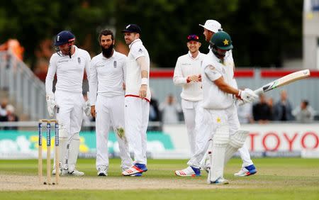 England v Pakistan - Second Test - Emirates Old Trafford - 25/7/16 England's Moeen Ali celebrates taking the wicket of Pakistan's Yasir Shah Action Images via Reuters / Jason Cairnduff Livepic