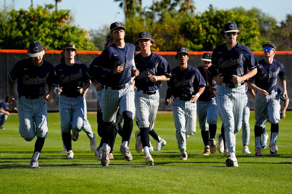 The Casteel Colts make their way from the outfield during the Boras Classic Baseball Tournament at Corona Del Sol in Tempe on March 13, 2024.