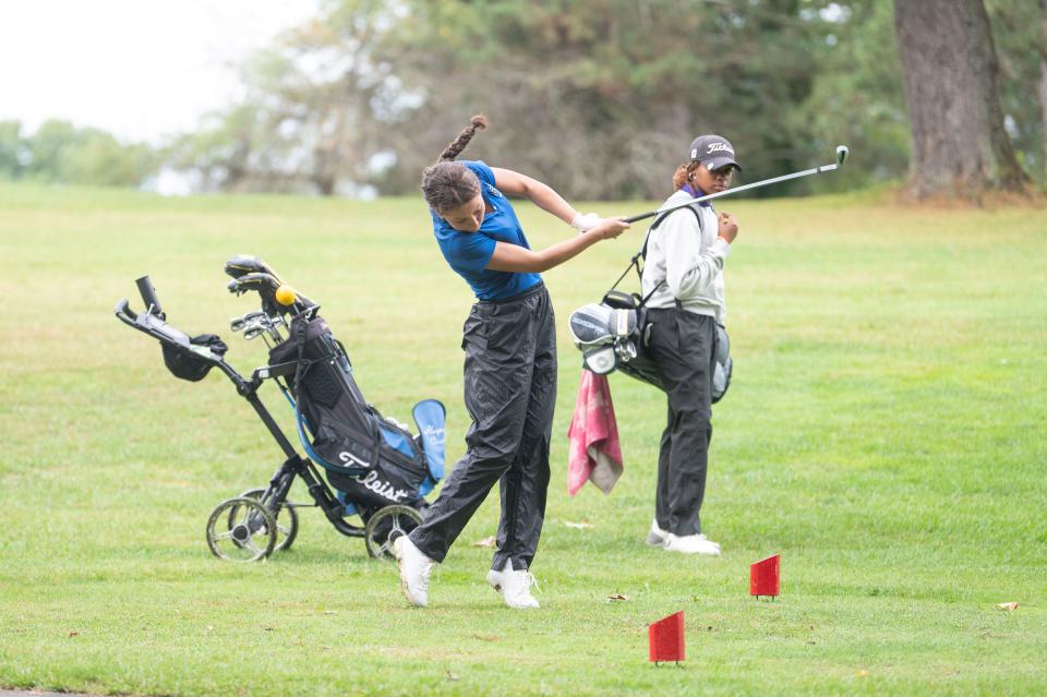 Harper Creek's Arabella Stanley tees off during the All-City girls golf tournament at Riverside Golf Club on Friday, Sept. 27, 2024.