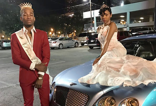 Prom attendees pose on cars in trend for 2017