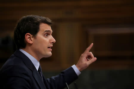 FILE PHOTO: Ciudadanos leader Albert Rivera gestures while giving a speech during a motion of no confidence debate at Parliament in Madrid, Spain, May 31, 2018. REUTERS/Susana Vera/Files