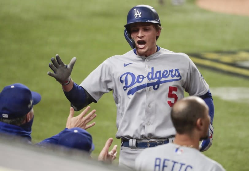 Arlington, Texas, Friday, October 16, 2020. Los Angeles Dodgers shortstop Corey Seager (5) homers.