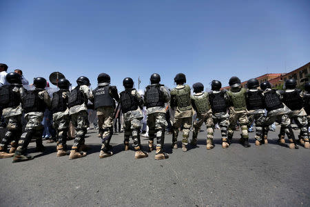 Afghan civil order policemen take position as Afghanistan's Hazara minority attend a protest in Kabul, Afghanistan July 23, 2016. REUTERS/Mohammad Ismail