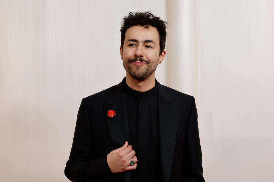 Ramy Youssef wears an "Artists4Ceasefire" pin at the 96th Academy Awards at the Dolby Theatre in Hollywood, California, on Sunday, March 10, 2024.