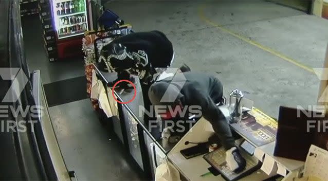 Two men entered a Rockhampton store on Tuesday August 9. At least one was armed with a knife. Source: 7News