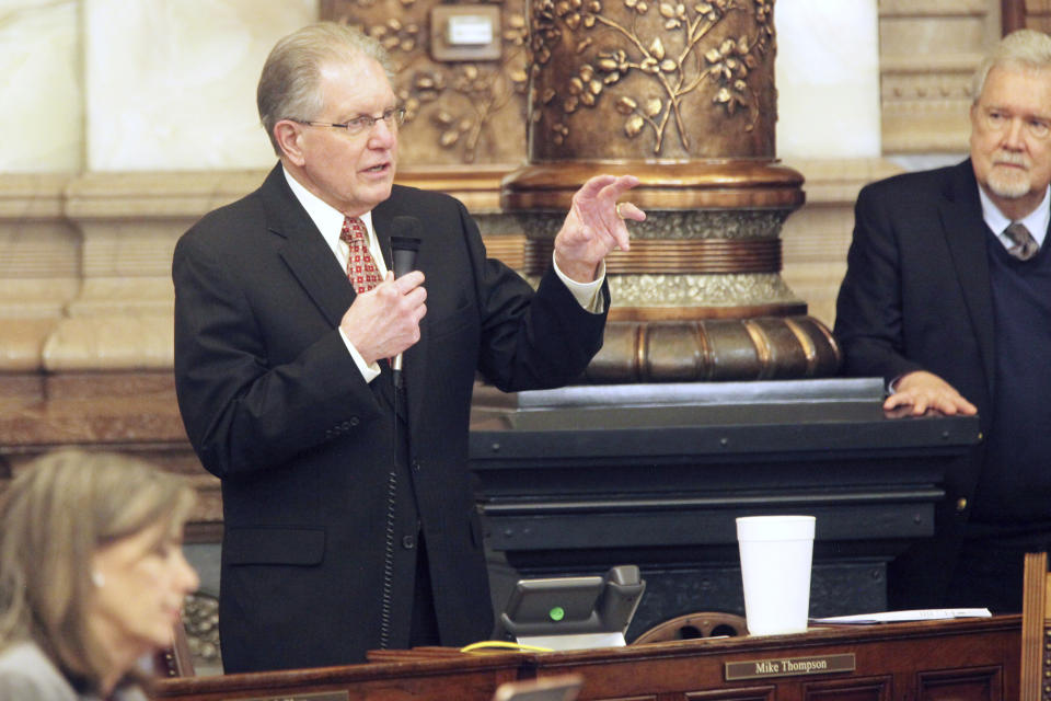 In this photo from Saturday, April 6, 2024, Kansas state Sen. Mike Thompson, R-Shawnee, speaks during a Senate debate at the Statehouse in Topeka, Kan. Thompson supports a ban on gender-affirming care for minors and says a provision that bars state employees from promoting it or promoting social transitioning for kids would help enforce the ban. (AP Photo/John Hanna)