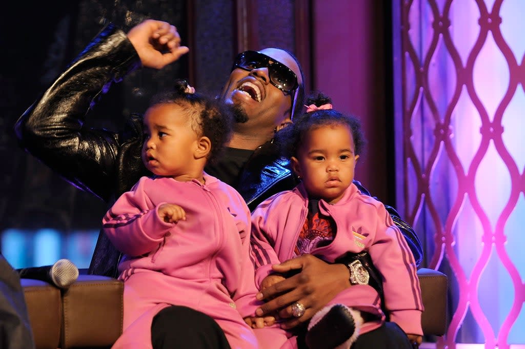 File: P Diddy with his daughters D'Lila Star Combs and Jessie James Combs in 2008 (Getty Images)