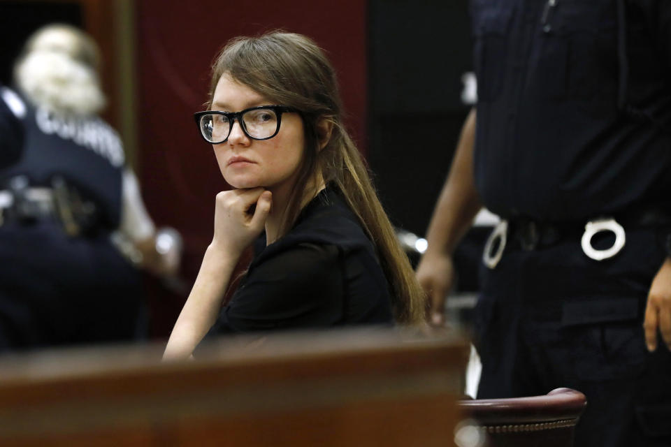 FILE - In this April 25, 2019 file photo, Anna Sorokin, who claimed to be a German heiress, sits at the defense table during jury deliberations in her trial at New York State Supreme Court, in New York. The New York Attorney General's Office recently invoked a state law that forbids criminals from profiting off their crimes in a court challenge to a Netflix deal Sorokin signed last year. Prosecutors say proceeds from the production should go to the Manhattan banks and hotels Sorokin defrauded out of nearly $200,000. (AP Photo/Richard Drew, File)