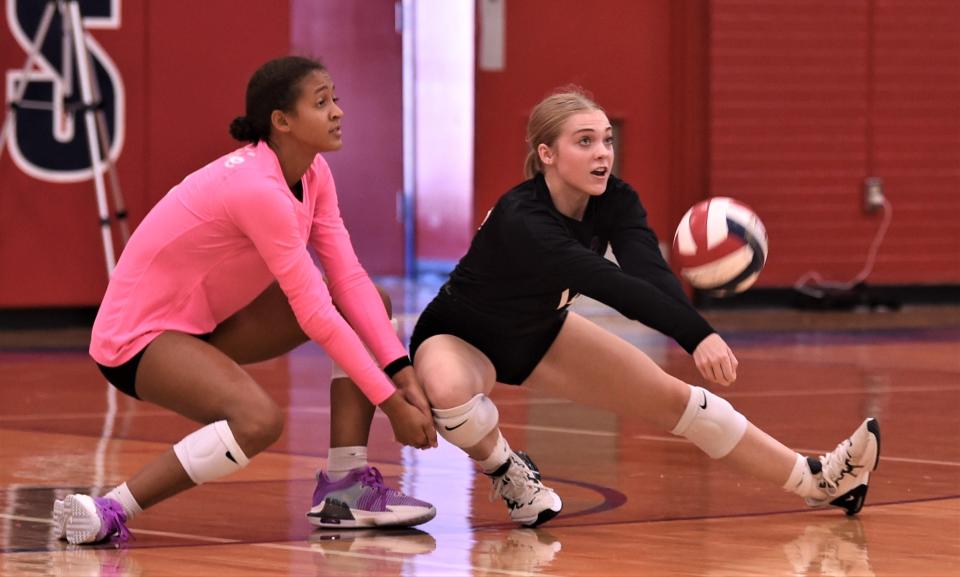 Wylie's Ella Huereman, right, digs a Wolfforth Frenship shot as Mycala Reed looks on. Frenship beat the Lady Bulldogs 25-21, 25-14 in the Bev Ball Classic semifinals Saturday at Cooper's Cougar Gym.