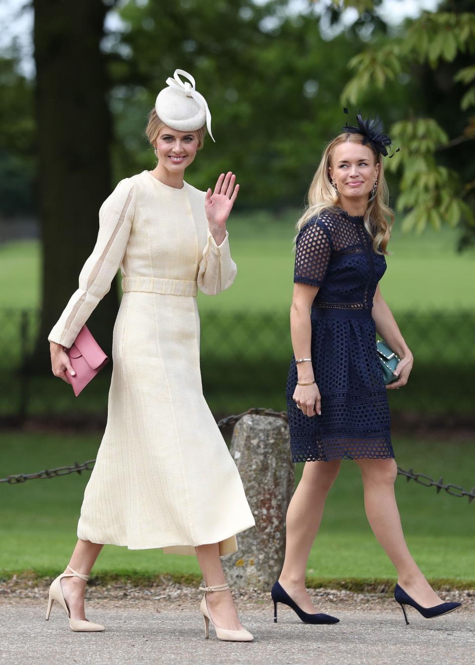 <p>Pippa appeared to have dropped her <a rel="nofollow" href="https://uk.style.yahoo.com/pippa-middleton-bans-model-vogue-williams-wedding-084138291.html" data-ylk="slk:‘no ring, no bring’ policy;elm:context_link;itc:0;sec:content-canvas;outcm:mb_qualified_link;_E:mb_qualified_link;ct:story;" class="link  yahoo-link">‘no ring, no bring’ policy</a> as her brother James Middleton’s girlfriend. Donna Air, attended the ceremony in a cream dress with nude heels and a light pink clutch. (Photo: PA) </p>