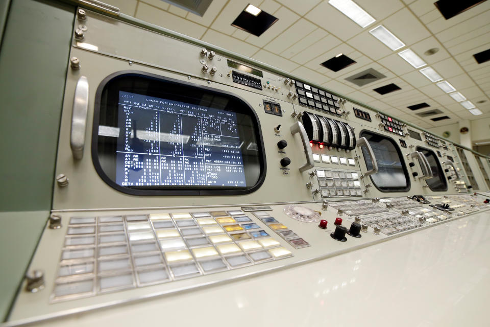 A rotary dial and other controls are shown on the console for the Instrumentation and Communications Officer, the 11th position on the third row inside the mission control room being restored to the Apollo mission era for the 50th anniversary of the Apollo moon landing at the NASA Johnson Space Center Monday, June 17, 2019, in Houston. (AP Photo/Michael Wyke)