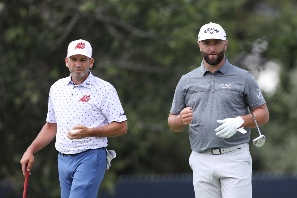 Jon Rahm in a practice round with Sergio Garcia