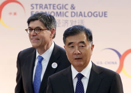 U.S. Treasury Secretary Jack Lew (L) and Chinese Vice Premier Wang Yang arrive at the Strategic and Economic Dialogue (S&ED) at the State Department in Washington June 23, 2015. REUTERS/Yuri Gripas