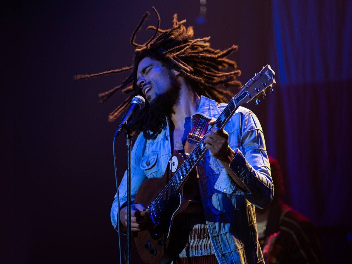 Bob Marley: One Love is the latest piece of media to reflect on the global reggae superstar. But a slew of negative reviews — citing a sort of hero worship the film exhibits — raises the question of how truthful a music biopic needs to be.  (Chiabella James - image credit)
