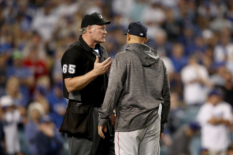 Umpire Ted Barrett worked all seven hours, 20 minutes behind home plate during World Series Game 3. (Getty Images)