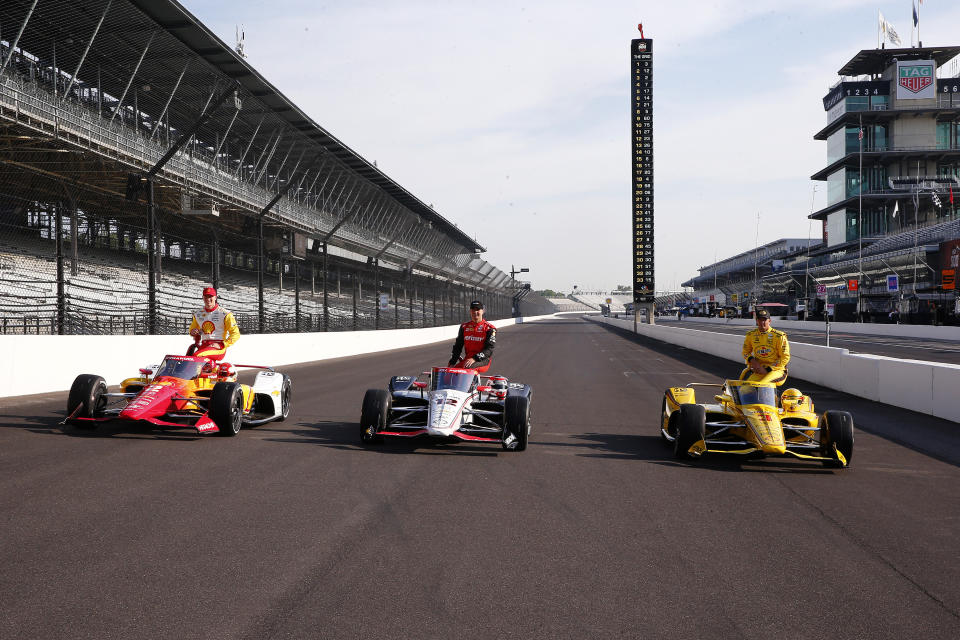 INDIANAPOLIS, IN - MAY 20: New Zealand's Scott Mclaughlin (3) rides for Team Penske, Australia's Will Power (12) rides for Team Penske and USA's Josef Newgarden (2) rides for Team Penske during the earlier photo shoot on the front row to the IndyCar Series Indianapolis 500 practice on May 20, 2024 at the Indianapolis Motor Speedway in Indianapolis, IN.  (Photo by Jeffrey Brown/Icon Sportswire via Getty Images)