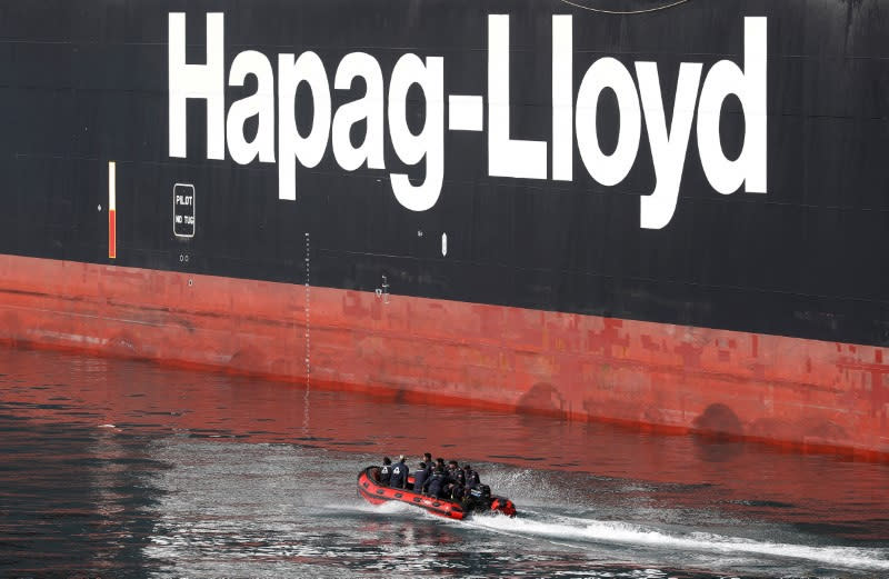 Hapag-Lloyd sign on a container ship is pictured at the Valparaiso port