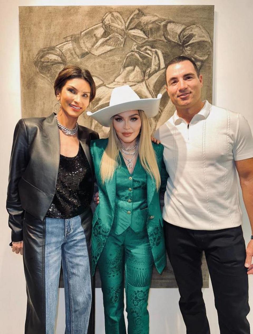 Madonna with Ingrid Casares and Chris Paciello at Rocco Ritchie’s solo art show in Miami’s Design District Wednesday night. Ritchie is a London-based artist and Madonna’s eldest son.