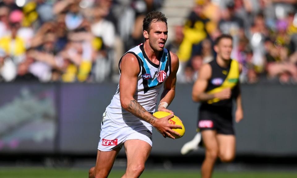 <span>Port Adelaide’s Jeremy Finlayson has been suspended for three weeks after he used a homophobic slur against an Essendon player during Gather Round.</span><span>Photograph: Morgan Hancock/AAP</span>