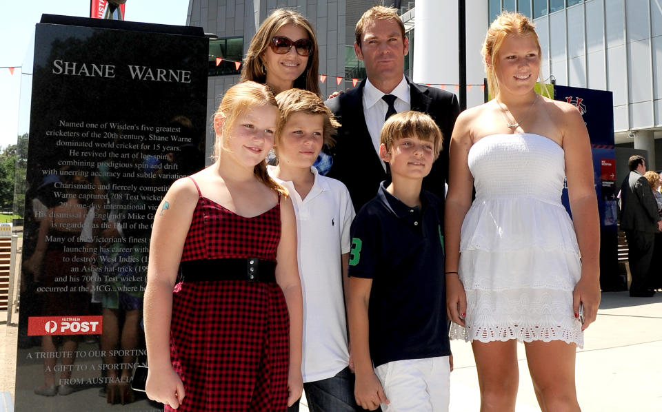 Liz Hurley and Shane Warne, pictured here with with Summer, Jackson, Damien and Brooke in 2011.