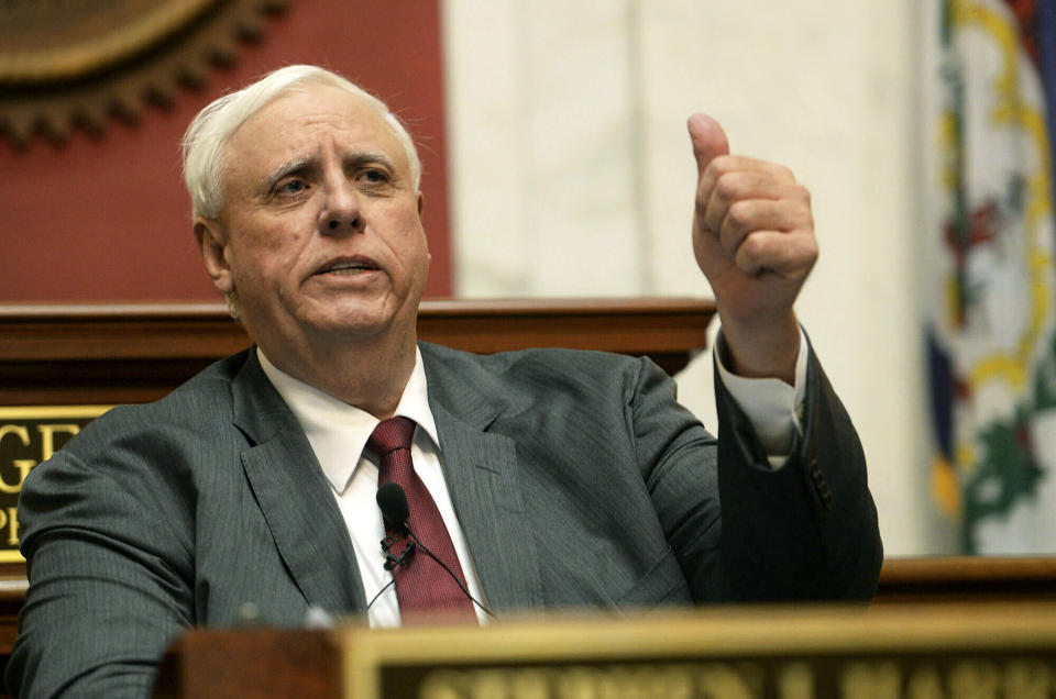 FILE - In this Jan. 9, 2019, file photo West Virginia Gov. Jim Justice delivers his State of the State address in the House of Delegates&#39; Chamber in Charleston, W.Va. A family business of West Virginia’s billionaire governor has maxed out a taxpayer-funded subsidy program meant to help farmers through the U.S. trade war with China. Records reviewed by The Associated Press show Justice Farms of North Carolina took in tens of thousands of taxpayer dollars from the program earlier this year.  (Chris Dorst/Charleston Gazette-Mail via AP, File)