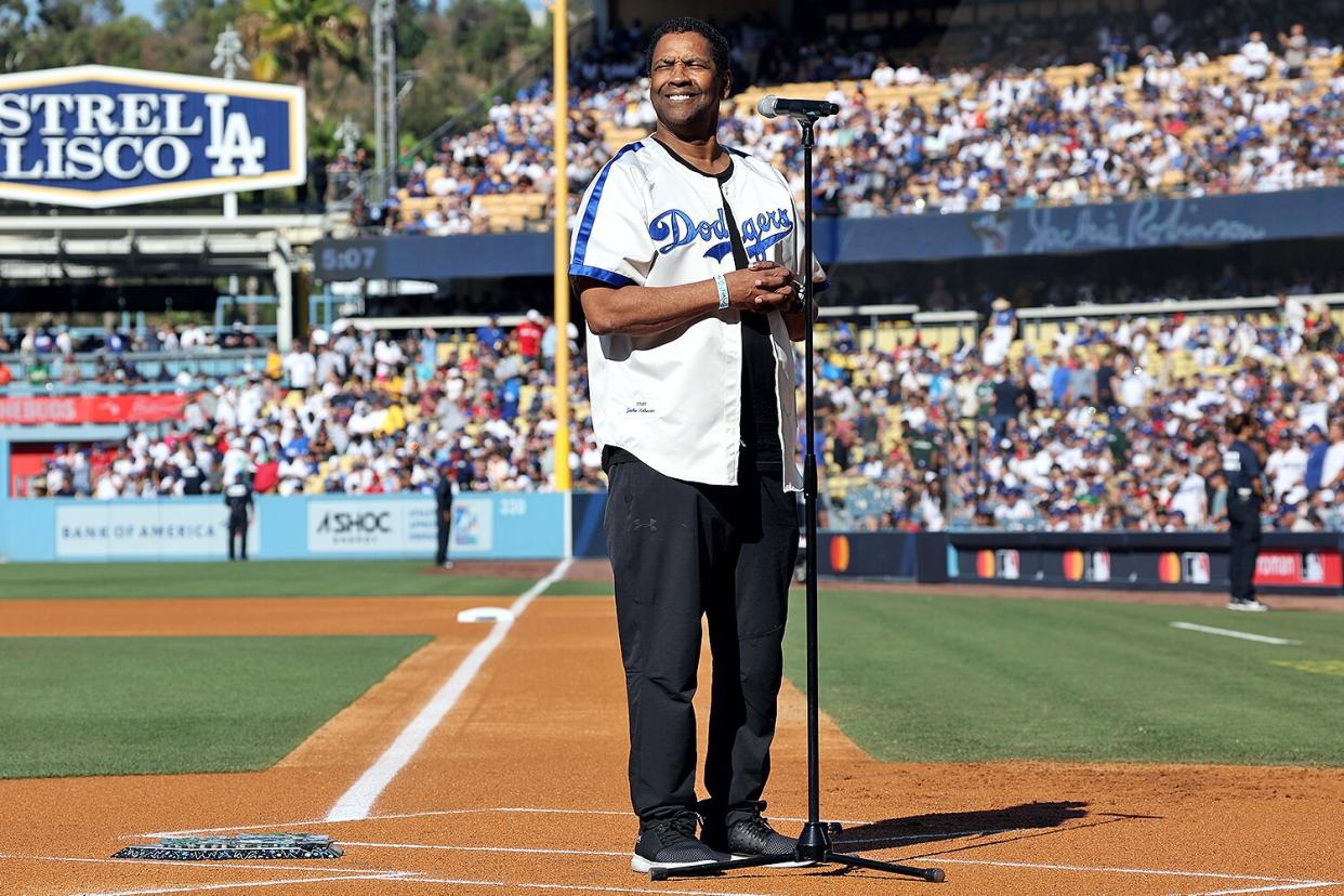 Denzel Washington leads a tribute to Jackie Robinson prior to the 92nd MLB All-Star Game presented by Mastercard at Dodger Stadium on Tuesday, July 19, 2022 in Los Angeles, California.