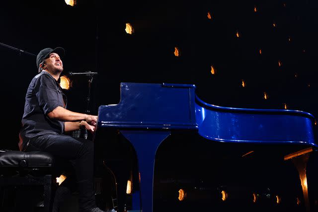 <p>John Shearer/Getty</p> Luke Bryan performs during the opening night of his residency at Resorts World Las Vegas on February 11, 2022 in Las Vegas, Nevada.