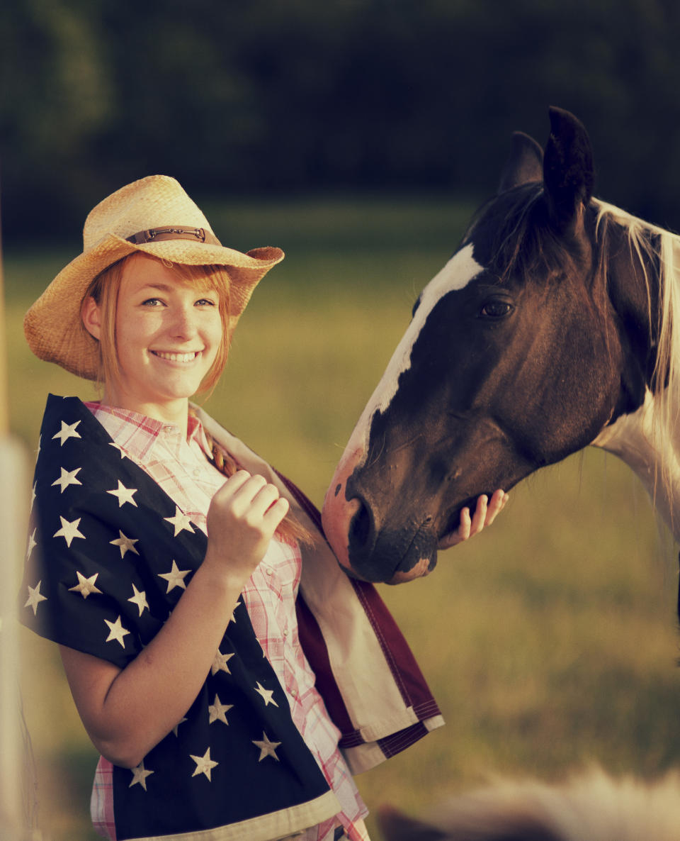 Out on the farm, women cloak themselves in symbols of their patriotic allegiance.