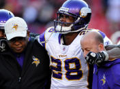 LANDOVER, MD - DECEMBER 24: Running back Adrian Peterson #28 of the Minnesota Vikings is helped off the field after being injured in the third quarter against the Washington Redskins at FedEx Field on December 24, 2011 in Landover, Maryland. (Photo by Patrick Smith/Getty Images)