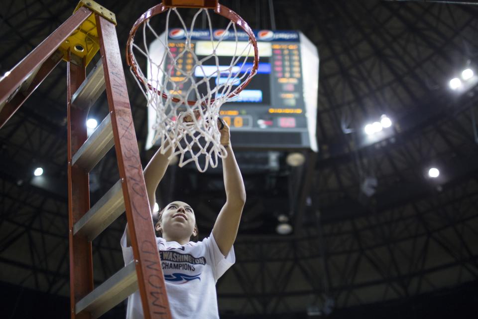 A scoreboard fell to the court while undergoing maintenance at George Washington University. (AP Photo)