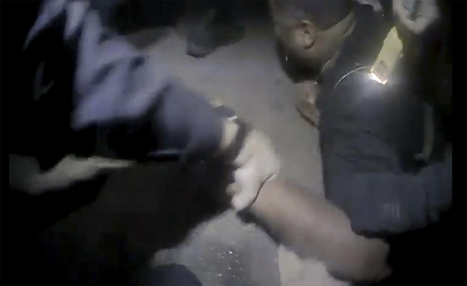 This screengrabs shows the arrest in Raleigh, N.C. of Darryl Tyree Williams, who died after being stunned repeatedly with stun guns on Jan. 17, 2023. Williams, 32, died at a hospital after being confronted and handcuffed by officers in a south east Raleigh neighborhood early Jan. 17, according to the report by Police Chief Estella Patterson. (City of Raleigh via AP)