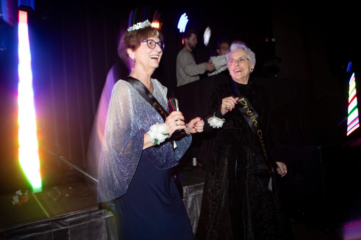 Ann Privrasky, right, dances after receiving a prom queen crown alongside fellow member of the class of 1962 Anne Mayes-Smith during North Eugene High School’s prom.